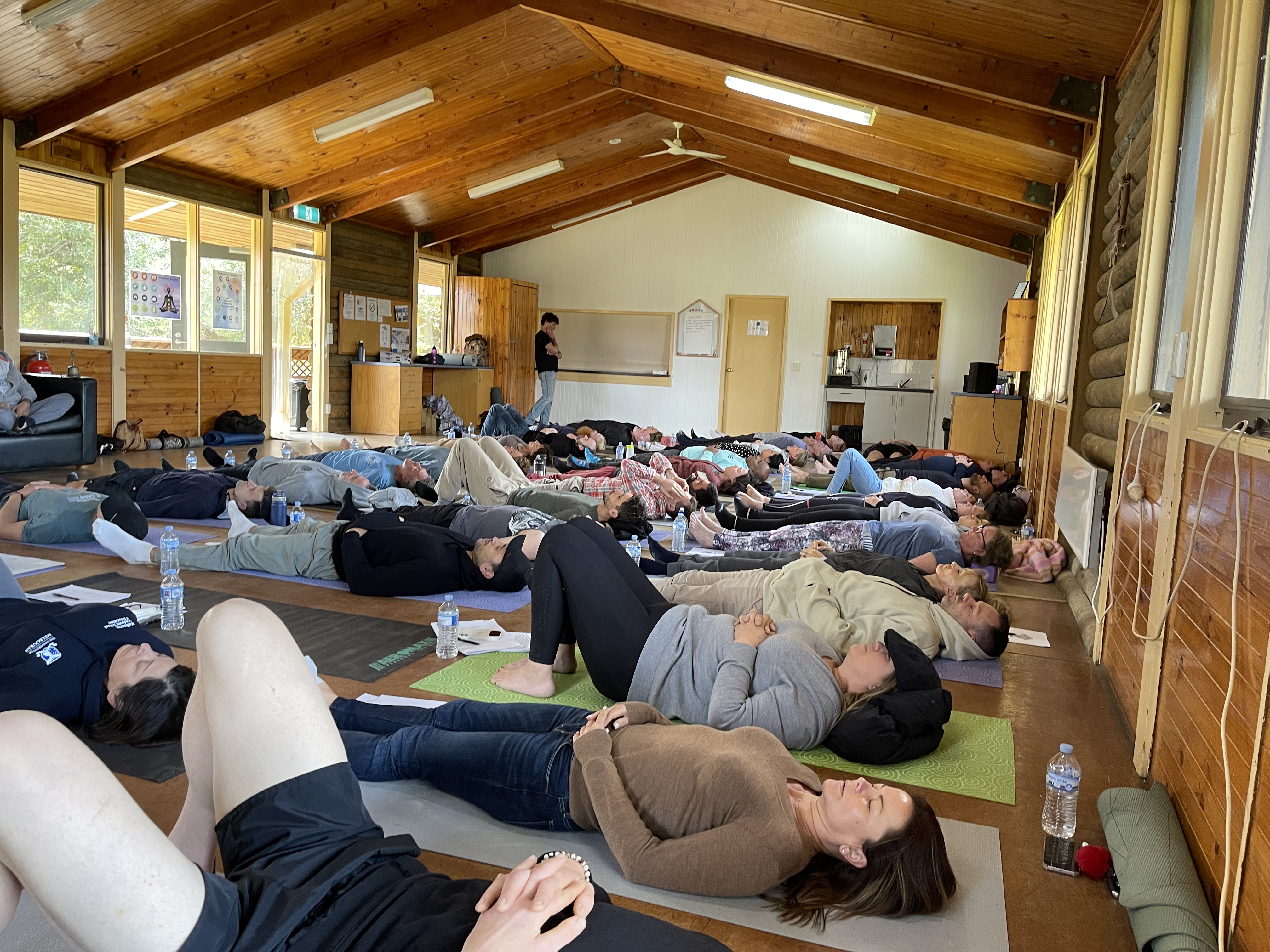 Group breathwork session at one of Haran's retreats